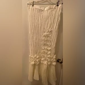 Dinna Vinci pleated skirt with cascading floral front.